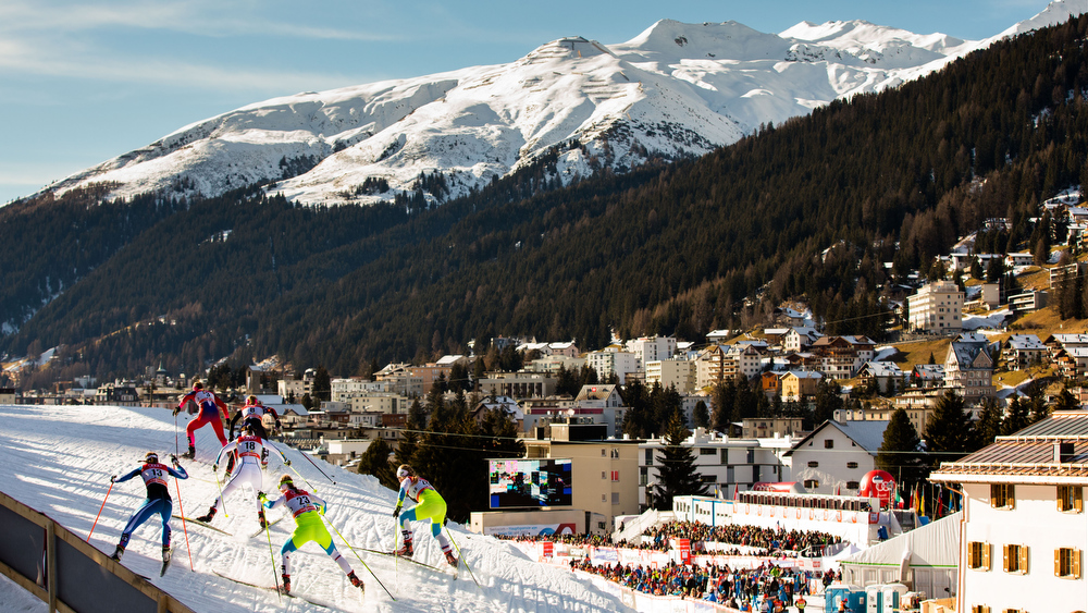 21.12.2014, Davos, Switzerland (SUI): a group of skiers at the track with panorama towards the village - FIS world cup cross-country, individual sprint, Davos (SUI). www.nordicfocus.com. © Laiho/NordicFocus. Every downloaded picture is fee-liable.