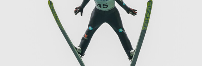 Vinzenz Geiger legt mit einem weiten Sprung die Grundlage für seinen Sieg.