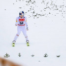 Johannes Lamparter freut sich über seinen guten Sprung.