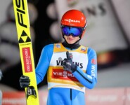 Julian Schmid (GER) freut sich über seinen Sprung.