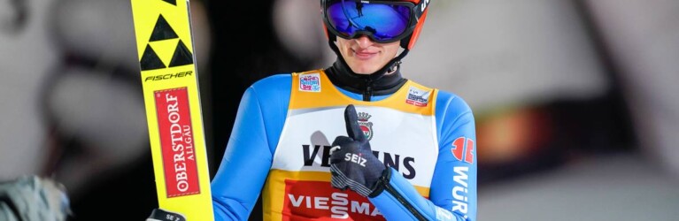 Julian Schmid (GER) freut sich über seinen Sprung.