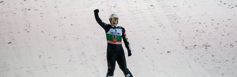 Matteo Baud (FRA) feiert seinen starken Sprung.