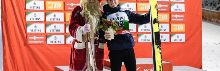 Matteo Baud (FRA) mit dem Weihnachtsmann
