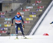 Magdalena Burger (GER) läuft vor den Olympischen Ringen.