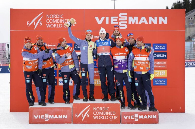 Eric Frenzel (GER), und bJarl Magnus Riiber (NOR) mit dem deutschen Trainerteam