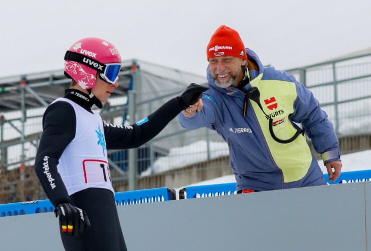 David Mach (GER) feiert mit Holger Meichsner seinen gelungenen Sprung.