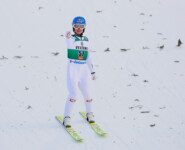 Johannes Lamparter (AUT) führt nach dem Springen.