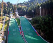 Die umgebauten Schanzen des Trampolino Giuseppe dal Ben in Predazzo sind im kommenden Winter Austragungsort der Olympischen Winterspiele.